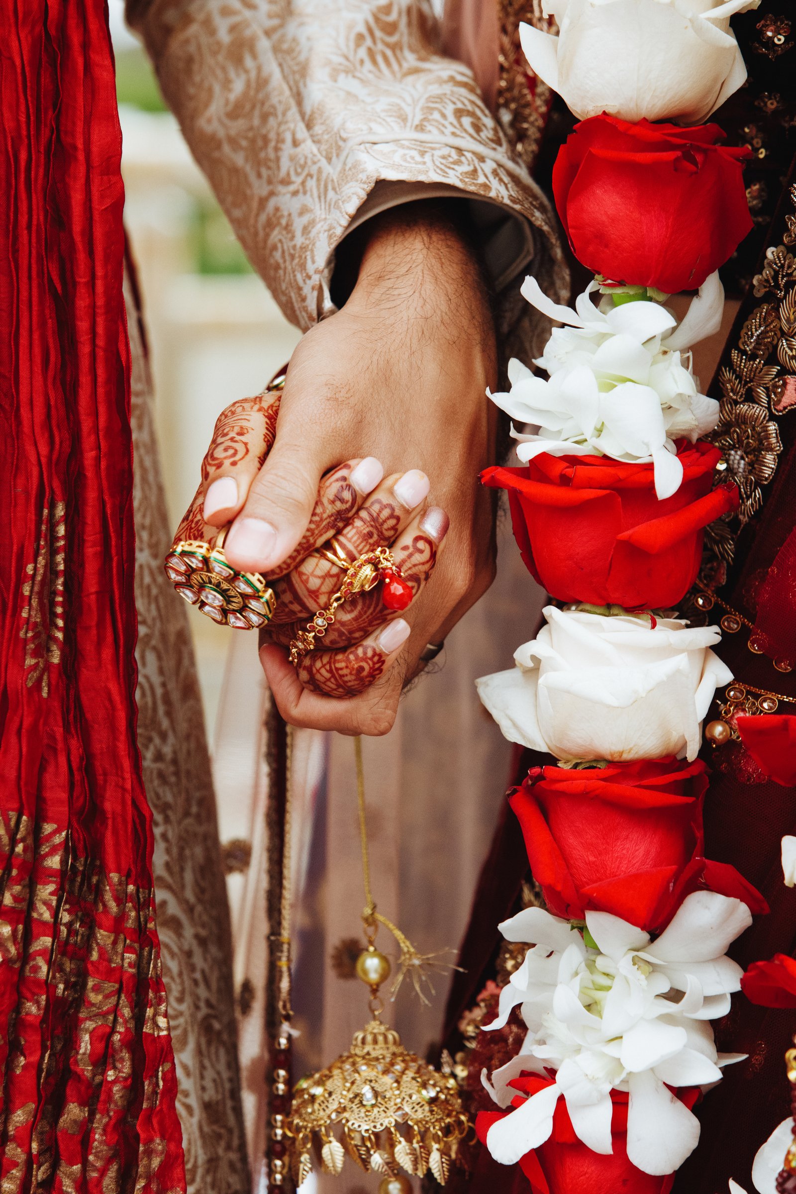 Bride and groom holding hands