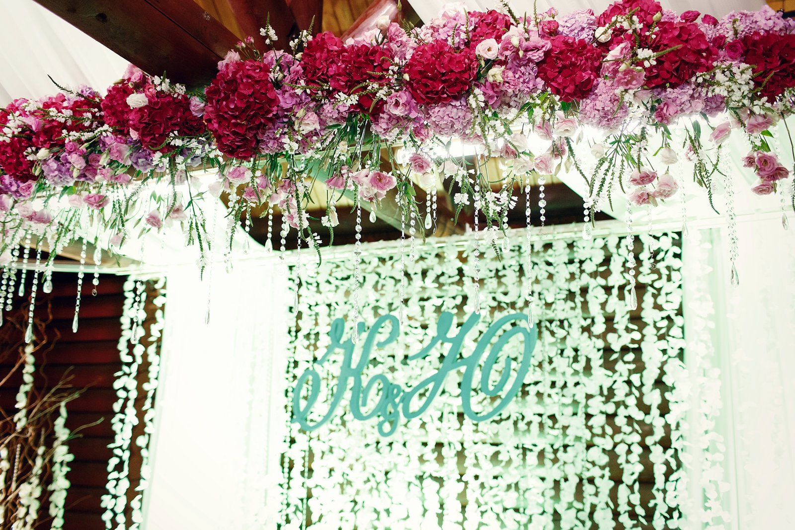 Newlywed initials before decorative lights